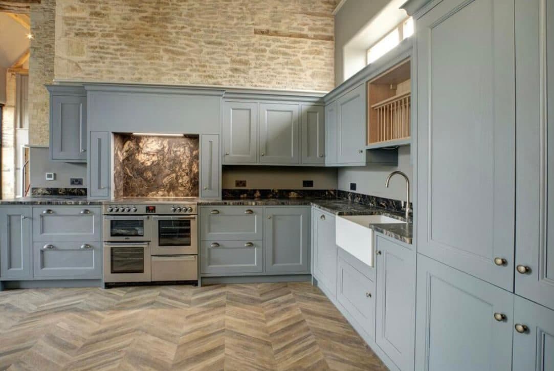 Grey shaker kitchen fully wired with under-cabinet lighting, sockets and a range cooker point