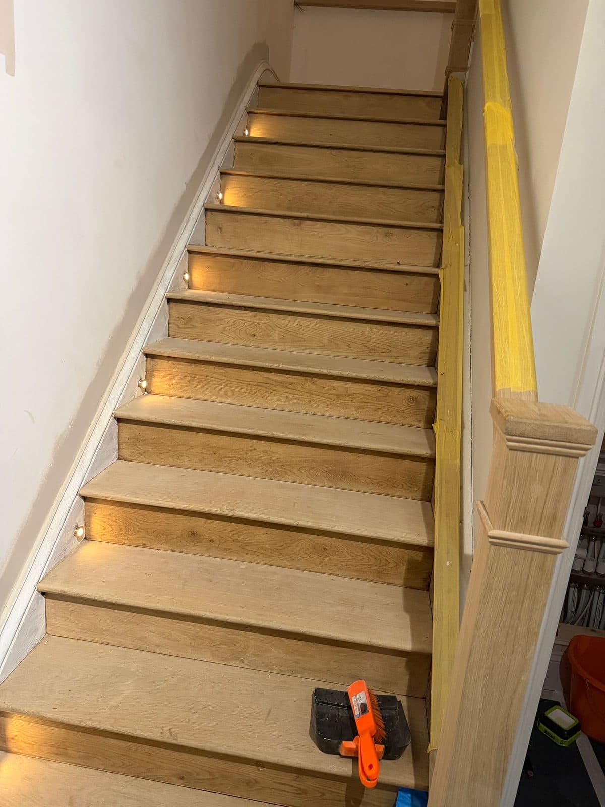 Oak staircase with recessed LED step lights fitted to each riser