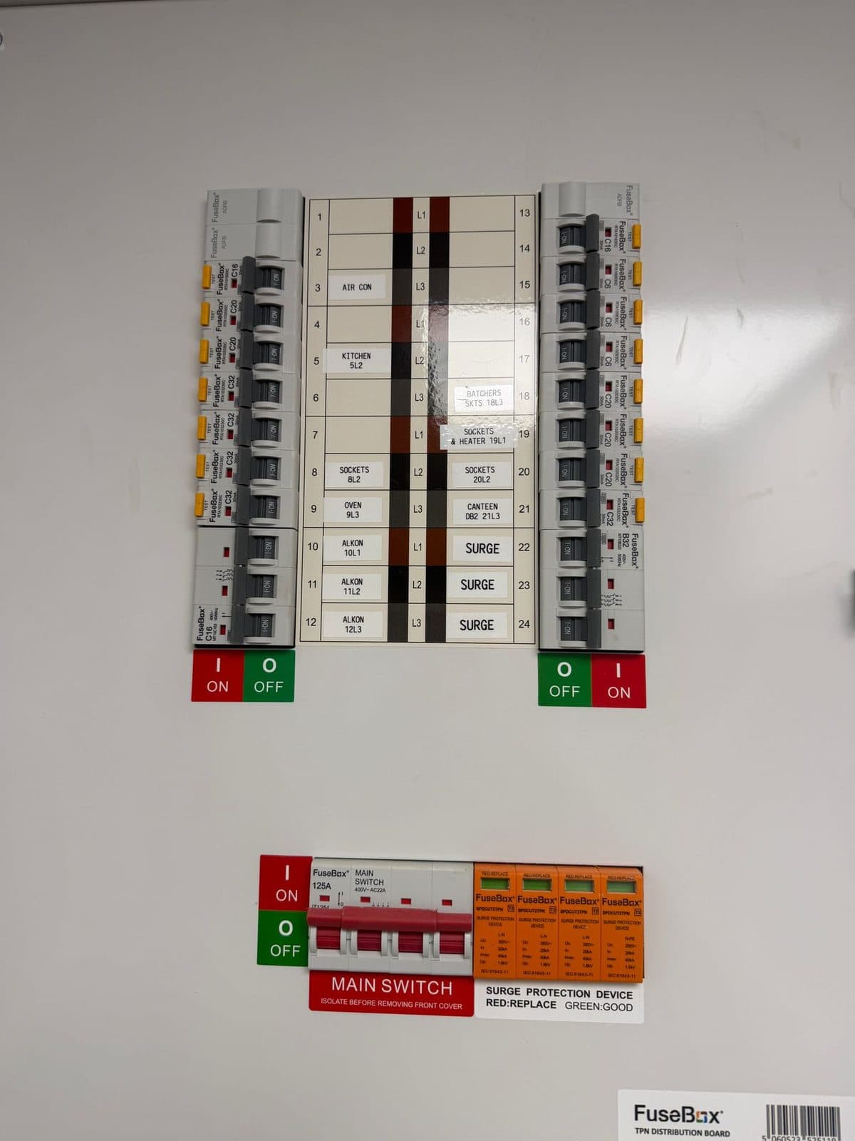 Three-phase commercial distribution board with surge protection, every circuit clearly labelled